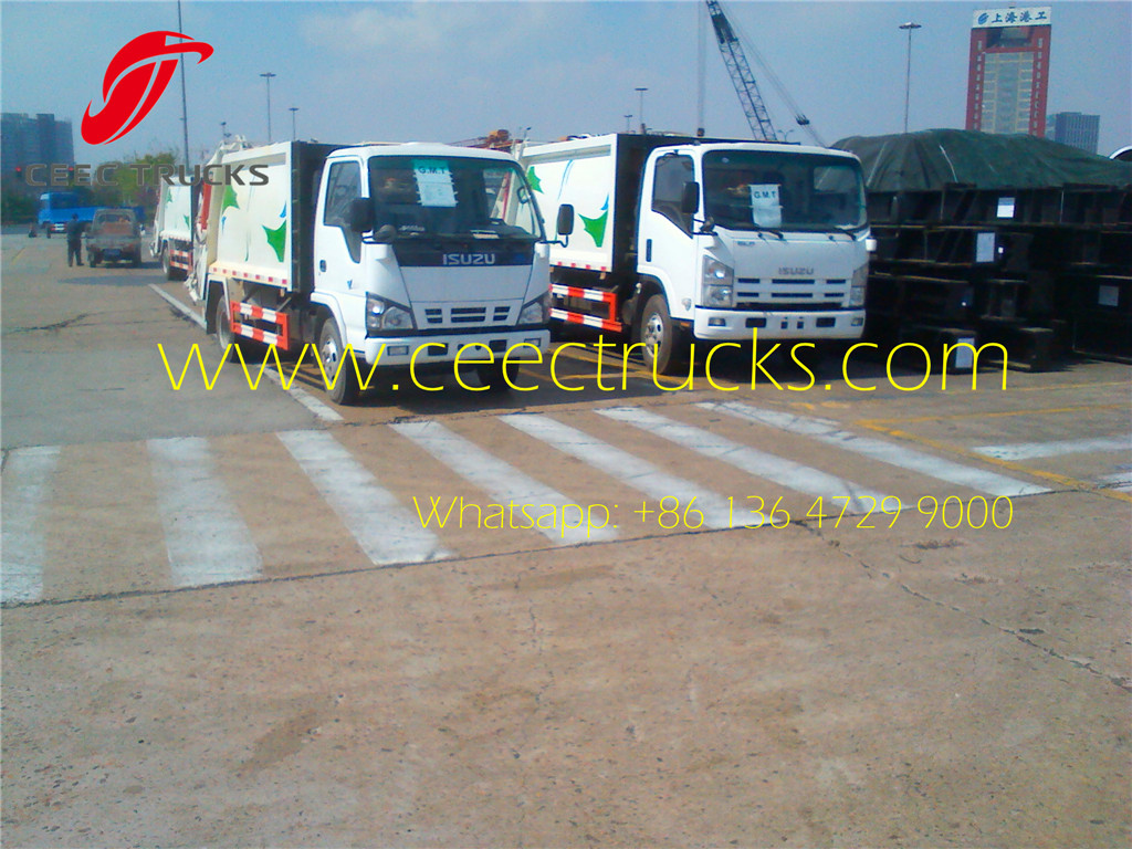 ISUZU 5cbm garbage compactor trucks at shanghai seaport