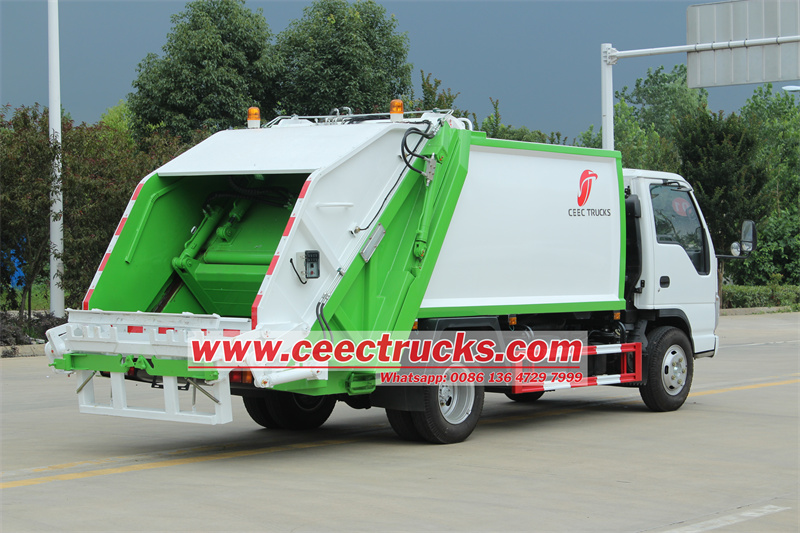 Isuzu rear loader refuse compactor truck