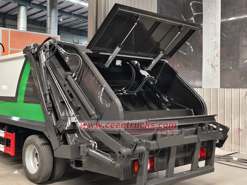 Customized trash compactor truck