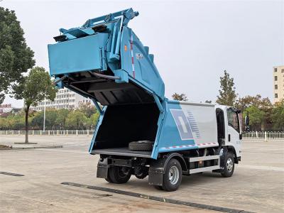 Isuzu KV600 garbage compactor truck